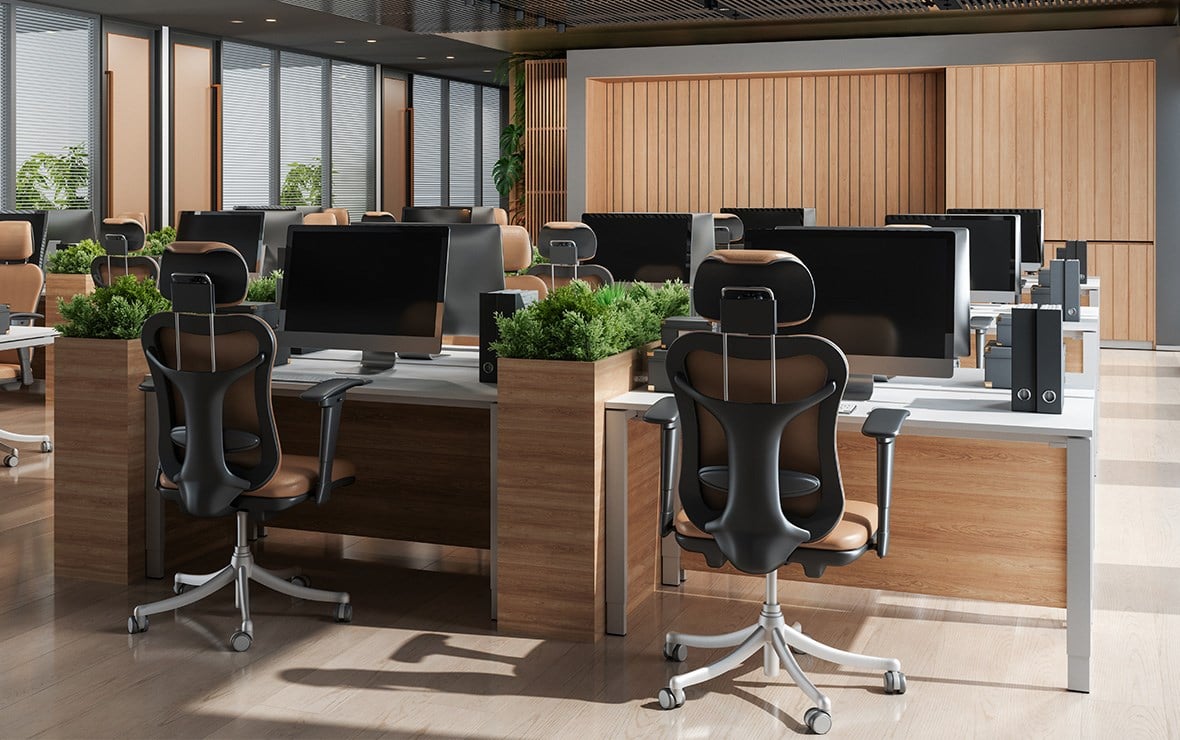 Lots of office computers on desks. 